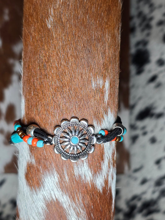 Turquoise And Orange Bracelet With Silver Concho