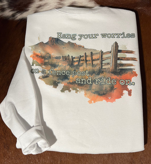 "Hang your worries on a fence post and ride on" white crewneck